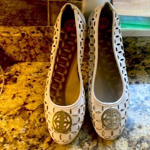 Rialto- Alto simmer white flat shoes trim in gold button never wore.